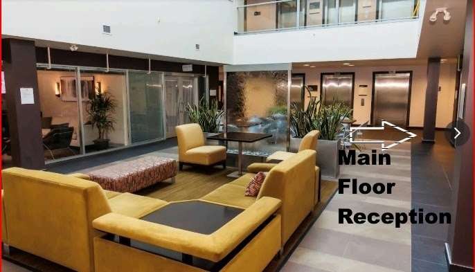 Main floor lobby of the Smart Executive Centre with seating area and elevators